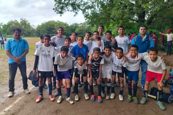 KHSG Boys triumph in thrilling 5-4 match, Adish scores winning goal.