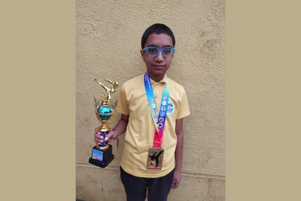Grade 6’s Prathmesh triumphs with gold at Shivamogga open national karate.