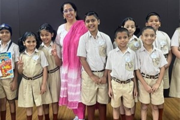 English educator judged elocution competition, encouraging confident communication, creativity, and public speaking skills.