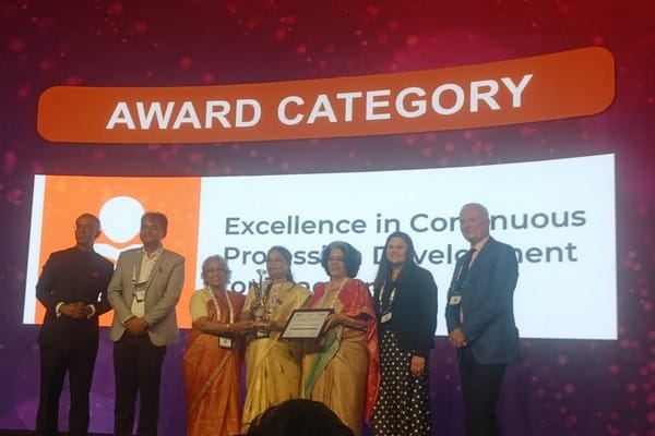 KHSG team with the ARISE Excellence Award on stage
