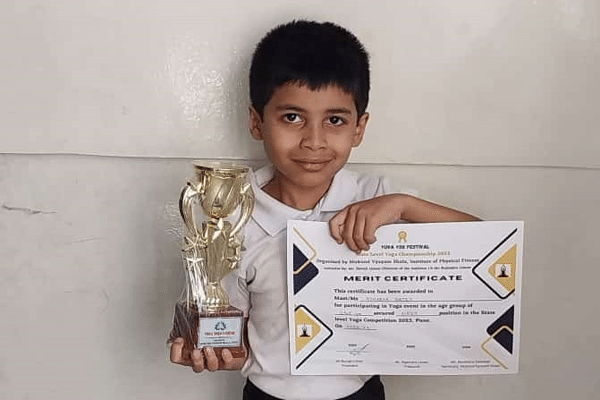 Atharva Date from Std 2 won the 1st prize in state level yoga competition.