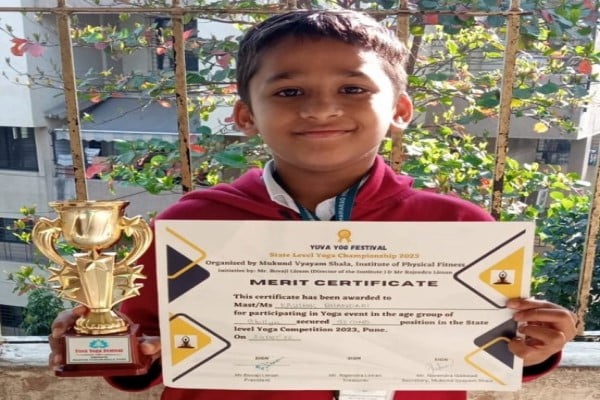 Kaushik Bhandari from Std 2 won the second prize in state level yoga competition.