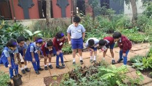 Curious students actively participating in nature activities.