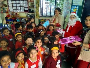 Christmas celebration in the school with a Santa clause.