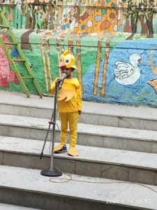 A Student dressed up as a Loony Toon performing his part on the school premise.