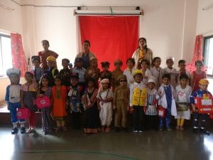 Students enjoy the fancy dress competition organized by the school.
