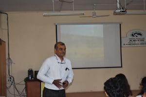 Dr. Kalmadi Shamarao Junior College teacher mentoring students in detail about some important things at Pune
