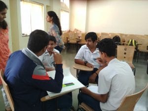 Dr. Kalmadi Shamarao Junior College's teacher focuses on group discussion and personal attention.