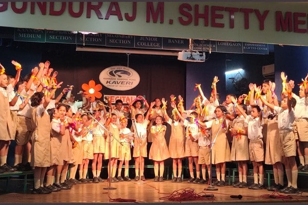 Students reciting a poem with ribbon actions at Recital Relay 2026